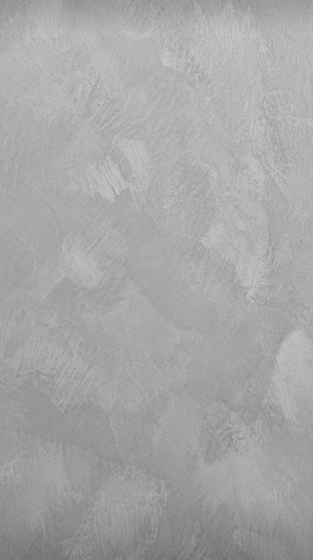 Smooth polished plaster finish in light grey